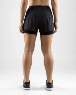 Craft Essential 2-in-1 Hardloop Short Zwart Dames 11 Craft Essential 2-in-1 Hardloop Short Zwart Dames -Sportwetsuit Winkel 1906029 999000 essential 2 in 1 shorts c3